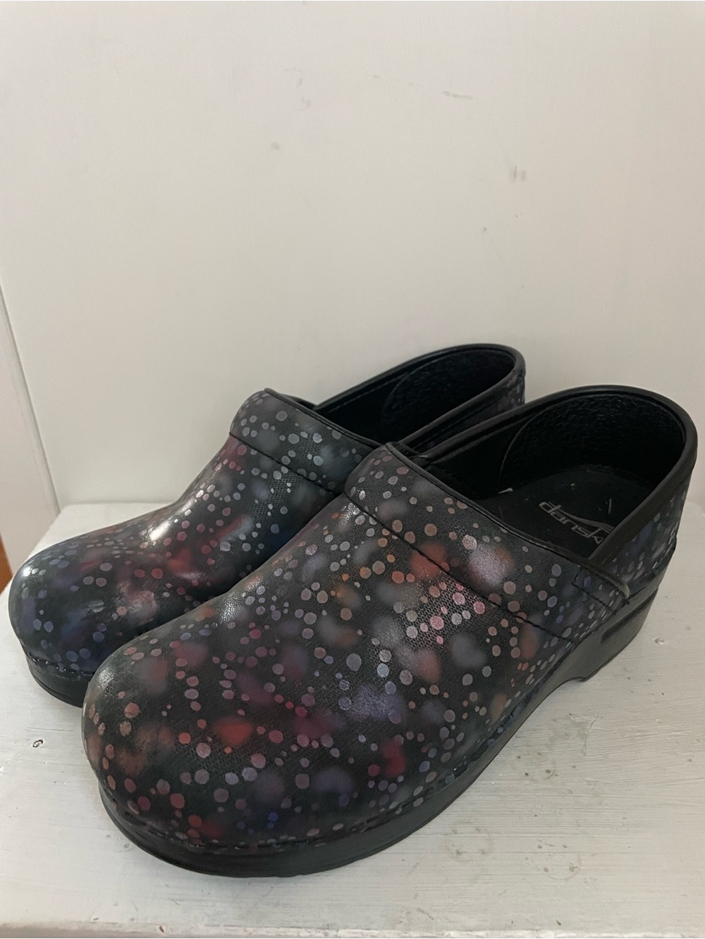 Dansko Black Multi Slip-On Clogs with Dot Pattern